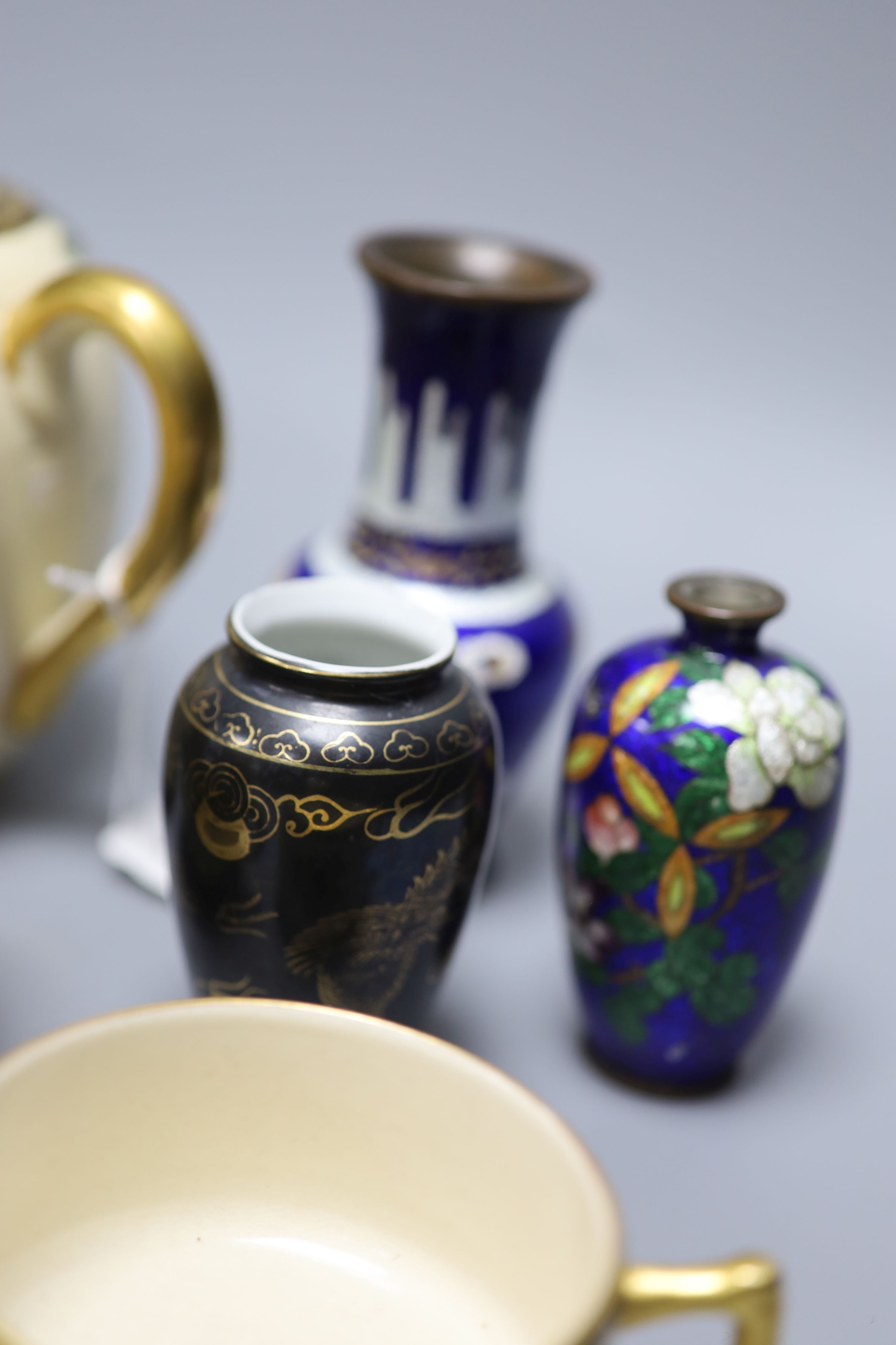 A group of Japanese cloisonne and satsuma wares